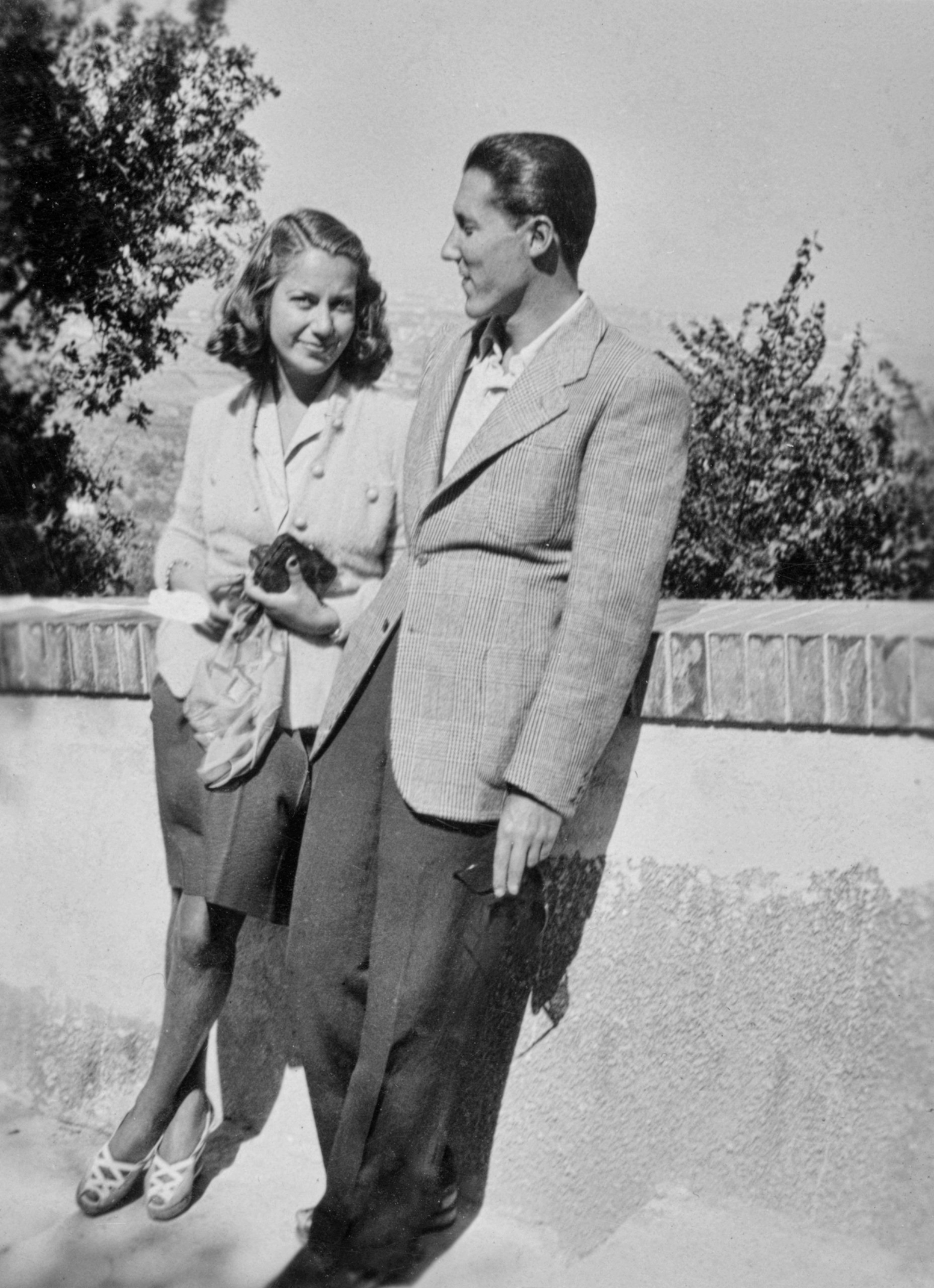 Dateable couple looking in each others eyes.